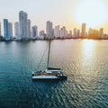 Catamaran cruising through Cartagena Bay at sunset with city skyline views - Juan Ballena | Travel Experiences in Cartagena